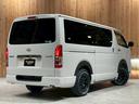 ハイエースバン スーパーGL ダークプライム 4WD フロントブッシュバー JAOSオーバーフェンダー ウシャリン16インチホイール オープンカントリーR/Tタイヤ インテリアパネルキット ベッドキット 両側パワースライドドア ストラーダSDナビ 中古車画像_2