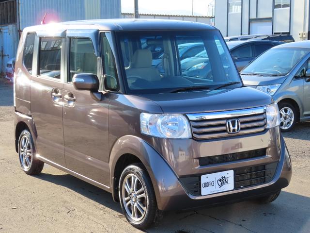 N-BOX G・Lパッケージ 4WD スライドドア スマートキー アイドリングストップ CVT 盗難防止システム ABS ESC アルミホイール 衝突安全ボディ エアコン パワーステアリング パワーウィンドウ 運転席エアバッグ(2枚目)