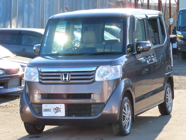 N-BOX G・Lパッケージ 4WD スライドドア スマートキー アイドリングストップ CVT 盗難防止システム ABS ESC アルミホイール 衝突安全ボディ エアコン パワーステアリング パワーウィンドウ 運転席エアバッグ(4枚目)