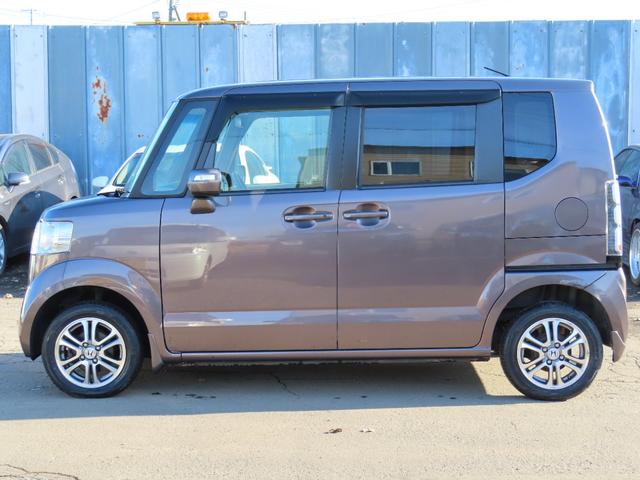 N-BOX G・Lパッケージ 4WD スライドドア スマートキー アイドリングストップ CVT 盗難防止システム ABS ESC アルミホイール 衝突安全ボディ エアコン パワーステアリング パワーウィンドウ 運転席エアバッグ(5枚目)