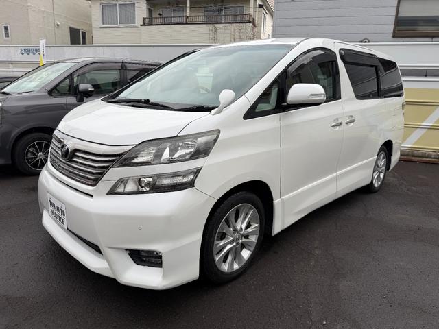 ヴェルファイア ２．４Ｚ　４ＷＤ☆夏冬タイヤ付☆ナビ☆ＴＶ☆後席モニター☆黒革調シートカバー☆両側電動スライドドア☆バックカメラ☆障害物センサー☆盗難防止☆横滑り防止☆ＥＴＣ☆プッシュスタート☆フロントフォグ☆車検整備２年付☆（6枚目）