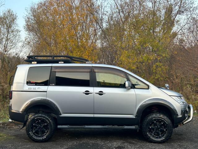 デリカD:5 D パワーパッケージ 4インチリフトアップ MKW16インチアルミ ガナドールマフラー サイドステップ JAOSリアラダー JAOSマッドフラップ ルーフラック クラッツィオシートカバー ドラレコ エンスタ ヒッチメンバー(4枚目)