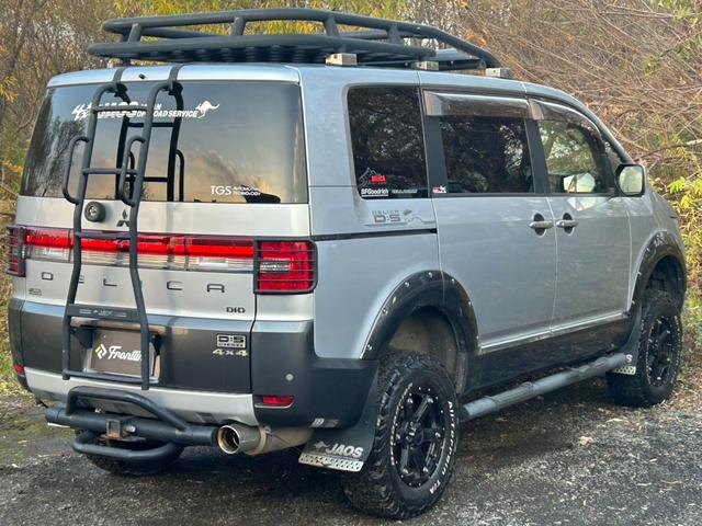 デリカD:5 D パワーパッケージ 4インチリフトアップ MKW16インチアルミ ガナドールマフラー サイドステップ JAOSリアラダー JAOSマッドフラップ ルーフラック クラッツィオシートカバー ドラレコ エンスタ ヒッチメンバー(5枚目)