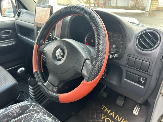 ジムニー ＸＧ　５速マニュアル　地デジ　バックカメラ　社外マフラー　グリル　エアクリ　バンパー（12枚目）