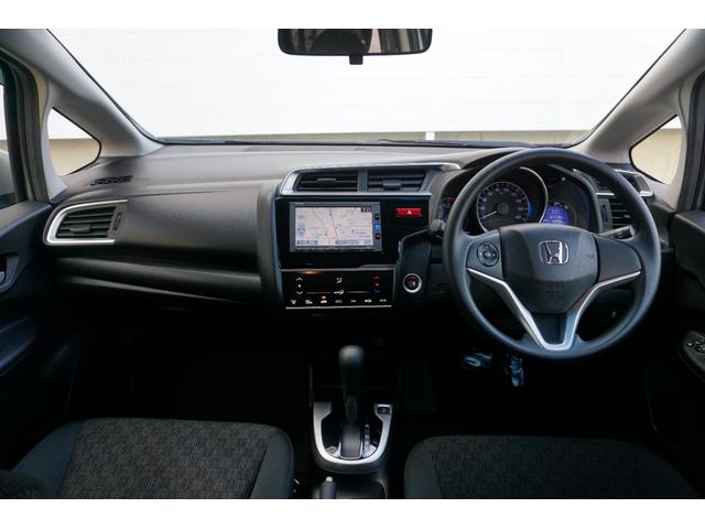 フィット １３Ｇ・Ｆパッケージ　ワンオーナー・純正ナビ（フルセグ）・コンフォートビューパッケージ・電動格納ミラー＋プライバシーガラス・オートリトラミラー・スーパーＵＶカットフロントドアガラス・プラズマクラスター（2枚目）