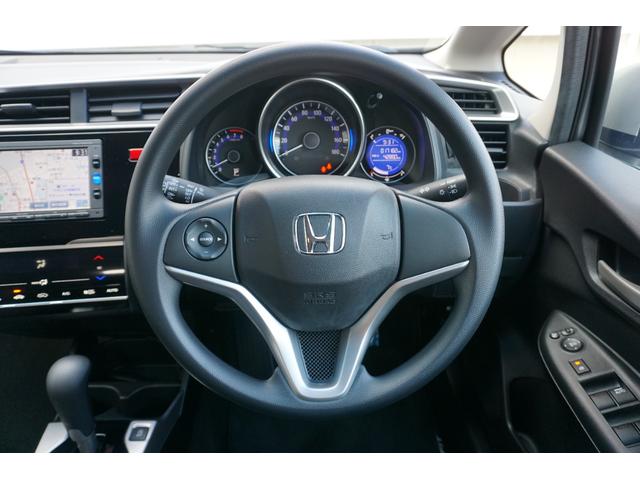 フィット １３Ｇ・Ｆパッケージ　ワンオーナー・純正ナビ（フルセグ）・コンフォートビューパッケージ・電動格納ミラー＋プライバシーガラス・オートリトラミラー・スーパーＵＶカットフロントドアガラス・プラズマクラスター（10枚目）