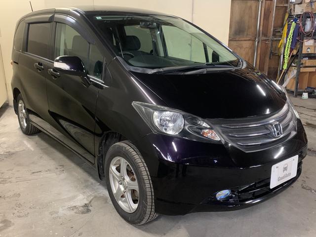 フリード G ジャストセレクション 4WD 社外オーディオ ミュージックプレイヤー接続 ETC 純正エンジンスターター 夏冬タイヤ付き 片側電動スライドドア 74800キロ(5枚目)