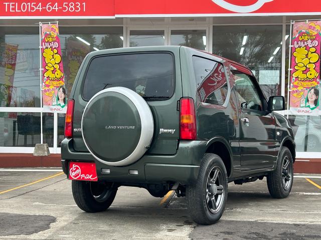 ジムニー ランドベンチャー オートマ/ナビTV/ドライブレコーダー/車検令和9年5月/ハーフレザーシート/シートヒーター/純正16インチアルミホイール/背面タイヤハードカバー/アップルあんしんライト保証1年付き/(3枚目)