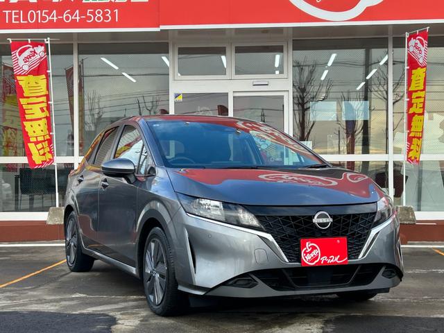 ノート X FOUR ハイブリッド4WD/ナビ/バックカメラ/ドラレコ/ETC/エマージェンシーブレーキ/シートヒーター/ステアヒーター/インテリジェントキー/プッシュスタート/車検整備付/アップルあんしんライト保証1年付(2枚目)