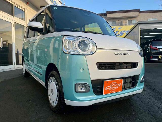 ムーヴキャンバス ストライプスＧ　ＥＴＣ　両側電動スライドドア　ＴＶ　クリアランスソナー　衝突被害軽減システム　オートライト　スマートキー　アイドリングストップ　電動格納ミラー　シートヒーター　ベンチシート　ＣＶＴ　ＥＳＣ　ＣＤ（4枚目）