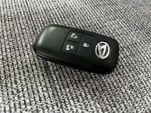 ムーヴキャンバス ストライプスＧ　ＥＴＣ　両側電動スライドドア　ＴＶ　クリアランスソナー　衝突被害軽減システム　オートライト　スマートキー　アイドリングストップ　電動格納ミラー　シートヒーター　ベンチシート　ＣＶＴ　ＥＳＣ　ＣＤ（27枚目）