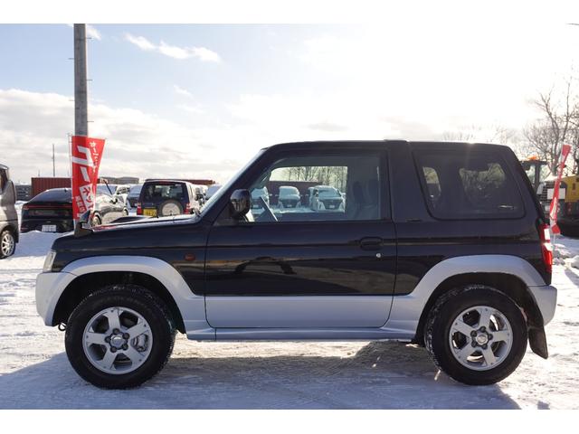 パジェロミニ 　４ＷＤ　ＶＲ　ターボ　走行距離５０５００ｋｍ　純正アルミホイール　オーディオ　ＡＢＳ　キーレス　エアコンクーラー　パワーウィンドウ　背面タイヤ（14枚目）