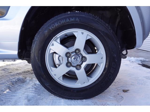 パジェロミニ 　４ＷＤ　ＶＲ　ターボ　走行距離５０５００ｋｍ　純正アルミホイール　オーディオ　ＡＢＳ　キーレス　エアコンクーラー　パワーウィンドウ　背面タイヤ（16枚目）