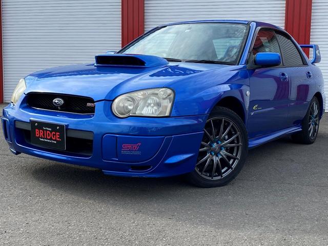 ＷＲＸ　２００３　Ｖリミテッド　４ＷＤ／ＭＯＭＯステアリング／社外足回り／フジツボ技研マフラー／社外ナビゲーション／オートエアコン／社外アルミホイール／ＥＴＣ／レーダー／取説(2枚目)