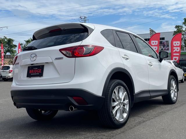 ＣＸ－５ ＸＤ　Ｌパッケージ　４ＷＤ／ディスプレイオーディオ／純正エンジンスターター／バックカメラ／スマートキー／シートヒーター／サイドカメラ／Ｂｌｕｅｔｏｏｔｈ接続／ＤＶＤ再生／クルーズコントロール／ＭＴモード付シフトレバー（8枚目）