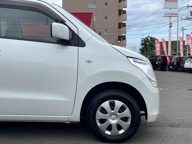ワゴンＲ ＦＸ　４ＷＤ／シートヒーター／キーレスキー／純正オーディオ／フルフラットシート／電格ミラー／アクセサリーソケット／シートアンダーボックス／インパネシフトレバー（11枚目）