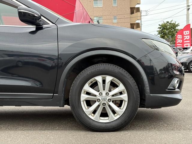 エクストレイル ２０Ｘｔ　エマージェンシーブレーキパッケージ　寒冷地仕様／４ＷＤ／純正フルセグ付ＴＶナビ／両側シートヒーター／衝突時被害軽減ブレーキ／純正エンジンスターター／スマートキー／ＥＴＣ／プッシュスタート／アクセサリーソケット／Ｂｌｕｅｔｏｏｔｈ接続（11枚目）