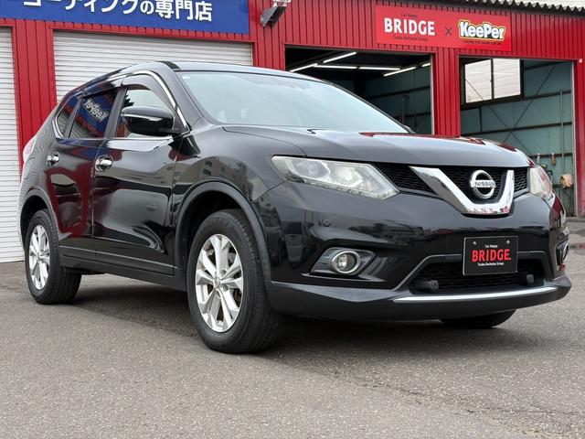 エクストレイル ２０Ｘｔ　エマージェンシーブレーキパッケージ　寒冷地仕様／４ＷＤ／純正フルセグ付ＴＶナビ／両側シートヒーター／衝突時被害軽減ブレーキ／純正エンジンスターター／スマートキー／ＥＴＣ／プッシュスタート／アクセサリーソケット／Ｂｌｕｅｔｏｏｔｈ接続（12枚目）