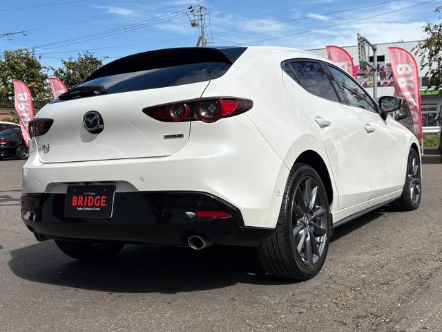ＭＡＺＤＡ３ファストバック ＸＤプロアクティブ　ツーリングセレクション　ディーゼルターボ／４ＷＤ／全方位カメラ／ＥＴＣ／フルセグＴＶ付純正ナビ／シートヒーター／パワーシート／スマートキー／プッシュスタート／パドルシフト／ＭＴモード付シフトレバー／オートＰブレーキ（8枚目）