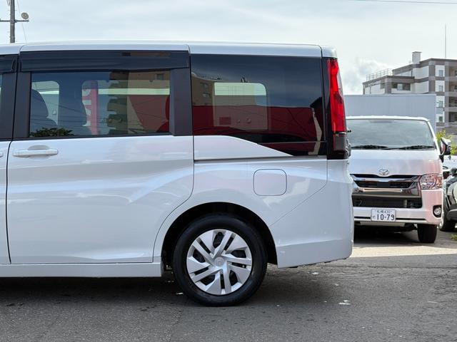 ステップワゴン Ｇ　４ＷＤ／パワースライドドア／純正ナビ／フルセグＴＶ／バックカメラ／フリップダウンモニター／純正エンジンスターター／ＥＴＣ／ワイパーデアイサー／ミラーヒーター／クルーズコントロール／後席エアコン（5枚目）