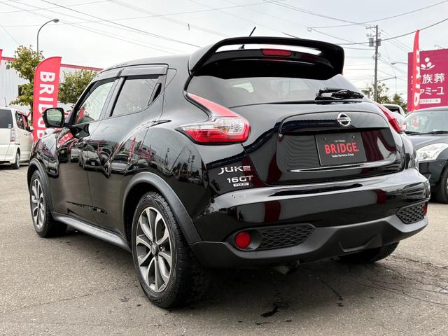ジューク １６ＧＴ　ＦＯＵＲ　１オーナー／純正フルセグナビ／全方位カメラ／ＥＴＣ／パートタイム４ＷＤ／ターボ／純正アルミホイール／ＭＴモード付シフトレバー／ＡＢＳ／ＡＡＣ／フルフラットシート／オートライト／フォグランプ（6枚目）