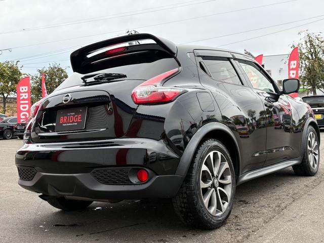 ジューク １６ＧＴ　ＦＯＵＲ　１オーナー／純正フルセグナビ／全方位カメラ／ＥＴＣ／パートタイム４ＷＤ／ターボ／純正アルミホイール／ＭＴモード付シフトレバー／ＡＢＳ／ＡＡＣ／フルフラットシート／オートライト／フォグランプ（8枚目）