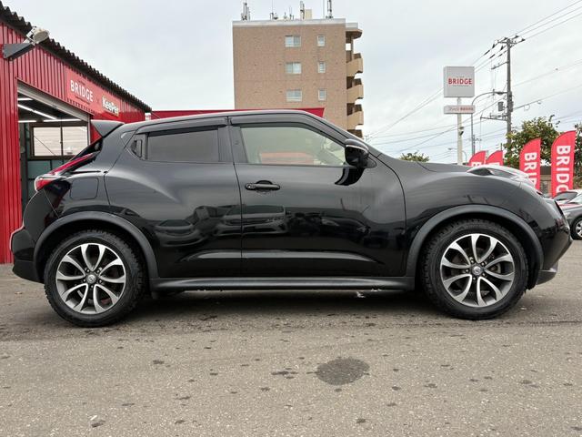 ジューク １６ＧＴ　ＦＯＵＲ　１オーナー／純正フルセグナビ／全方位カメラ／ＥＴＣ／パートタイム４ＷＤ／ターボ／純正アルミホイール／ＭＴモード付シフトレバー／ＡＢＳ／ＡＡＣ／フルフラットシート／オートライト／フォグランプ（10枚目）