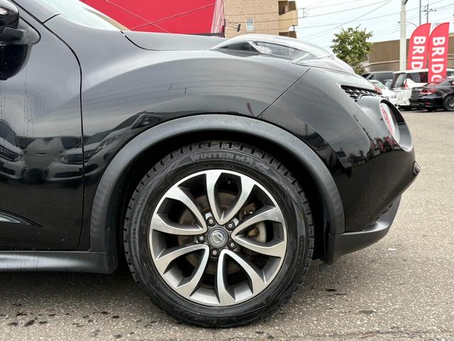 ジューク １６ＧＴ　ＦＯＵＲ　１オーナー／純正フルセグナビ／全方位カメラ／ＥＴＣ／パートタイム４ＷＤ／ターボ／純正アルミホイール／ＭＴモード付シフトレバー／ＡＢＳ／ＡＡＣ／フルフラットシート／オートライト／フォグランプ（11枚目）