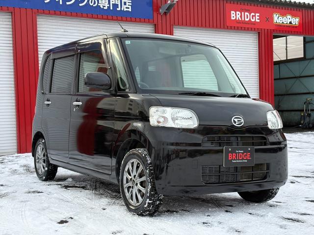 タント Ｌ　４ＷＤ／寒冷地仕様／ピラーレススライドドア／純正オーディオ／フルフラットシート／社外Ｅ／ｇスターター／社外ドライブレコーダー／キーレスキー／取扱説明書／エアコン／電格サイドミラー／アクセサリーソケット（12枚目）
