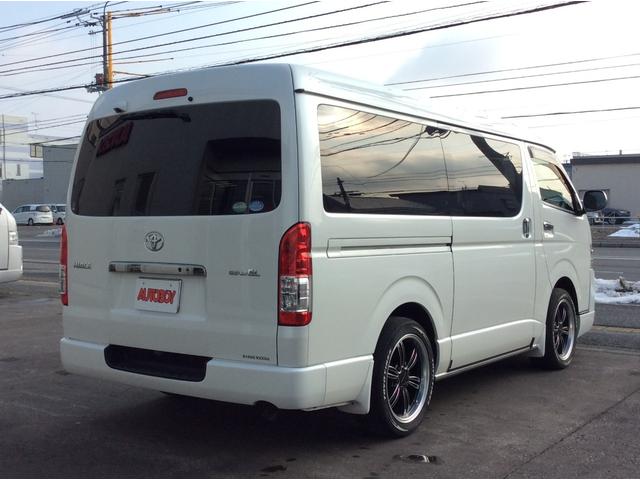 ハイエースバン スーパーＧＬ　ダークプライム　ワイド　４ＷＤ　寒冷地　両側パワスラ　リアヒーター＆クーラー　プッシュスタート　スマートキー　ハーフレザーシート　ベッドキッド　メモリナビ　フルセグＴＶ　フリップダウンモニター　バックカメラ　ＥＴＣ（6枚目）