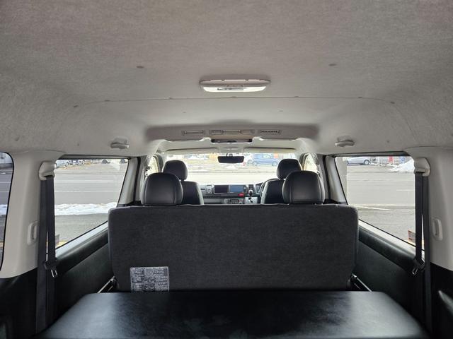 ハイエースバン スーパーＧＬ　ダークプライム　ワイド　４ＷＤ　寒冷地　両側パワスラ　リアヒーター＆クーラー　プッシュスタート　スマートキー　ハーフレザーシート　ベッドキッド　メモリナビ　フルセグＴＶ　フリップダウンモニター　バックカメラ　ＥＴＣ（36枚目）