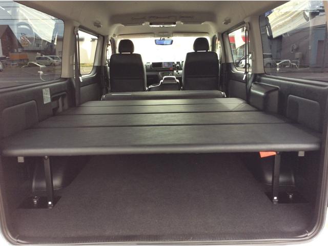 ハイエースバン スーパーＧＬ　ダークプライム　ワイド　４ＷＤ　寒冷地　両側パワスラ　リアヒーター＆クーラー　プッシュスタート　スマートキー　ハーフレザーシート　ベッドキッド　メモリナビ　フルセグＴＶ　フリップダウンモニター　バックカメラ　ＥＴＣ（45枚目）