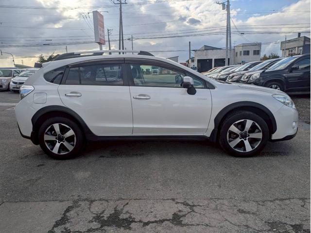 ＸＶハイブリッド ２．０ｉ－Ｌ　アイサイト　４ＷＤ　ＨＤＤナビ　フルセグＴＶ　リアカメラ　スマートキー　ＨＩＤヘッドライト　衝突軽減ブレーキ　Ｂｌｕｅｔｏｏｔｈ　クルコン　純正１７インチアルミ　ＥＴＣ（7枚目）