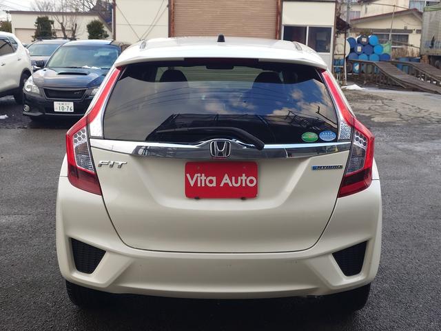 フィットハイブリッド Ｌパッケージ　４ＷＤ　メモリーナビ　ワンセグＴＶ　スマートキー　衝突軽減ブレーキ　Ｂｌｕｅｔｏｏｔｈ　クルコン　純正１５インチ鉄　ＥＴＣ（12枚目）