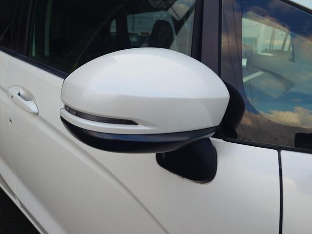 フィットハイブリッド Ｌパッケージ　４ＷＤ　メモリーナビ　ワンセグＴＶ　スマートキー　衝突軽減ブレーキ　Ｂｌｕｅｔｏｏｔｈ　クルコン　純正１５インチ鉄　ＥＴＣ（17枚目）