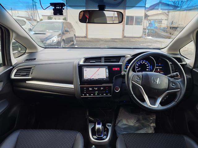 フィットハイブリッド Ｌパッケージ　４ＷＤ　メモリーナビ　ワンセグＴＶ　スマートキー　衝突軽減ブレーキ　Ｂｌｕｅｔｏｏｔｈ　クルコン　純正１５インチ鉄　ＥＴＣ（18枚目）