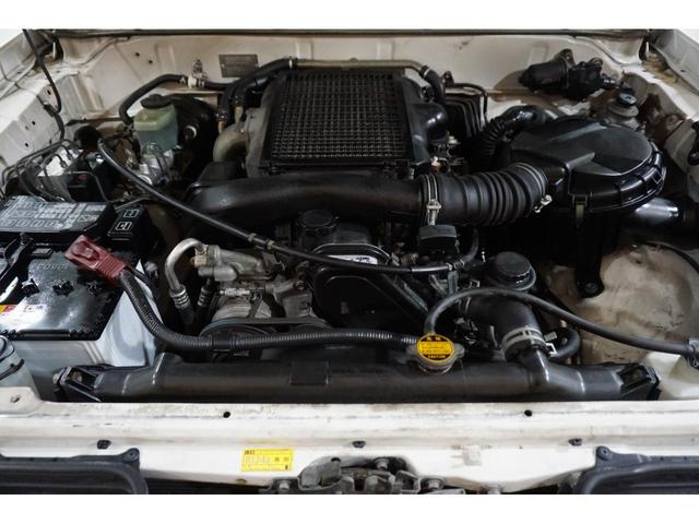 RJ 4WD・本州仕入・5速マニュアル・ディーゼルターボ・デフロック・ナローボディ・新品輸出仕様ホイール&新品ジオランダーM/T・背面タイヤ・社外ナビ&TV&Bluetooth・社外キーレス・Tベルト済み(70枚目)