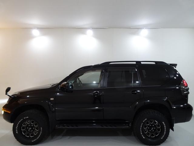 ランドクルーザープラド ＴＸリミテッド　４ＷＤ／本州仕入／寒冷地仕様／後期型／８人乗／新革調シートカバー／サンルーフ／リフトアップ／メッシュグリル＆ＴＯＹＯＴＡエンブレム／ＢＦグッドリッチ／社外テール／インナーブラックイカリング付きＨライト（15枚目）