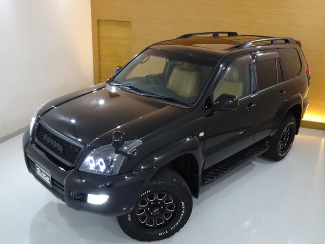 ランドクルーザープラド ＴＸリミテッド　４ＷＤ／本州仕入／寒冷地仕様／後期型／８人乗／新革調シートカバー／サンルーフ／リフトアップ／メッシュグリル＆ＴＯＹＯＴＡエンブレム／ＢＦグッドリッチ／社外テール／インナーブラックイカリング付きＨライト（22枚目）