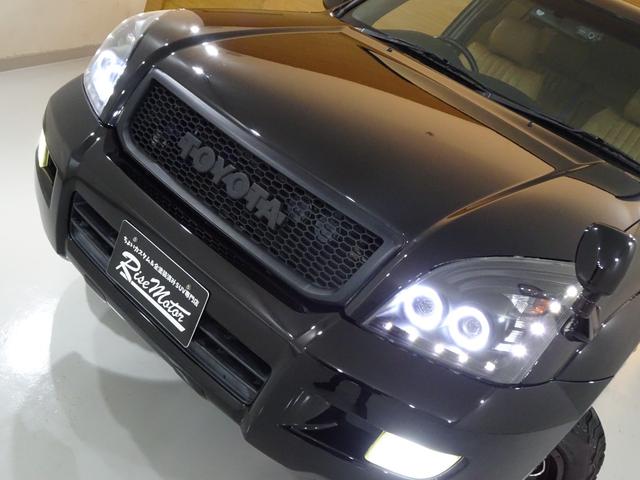 ランドクルーザープラド ＴＸリミテッド　４ＷＤ／本州仕入／寒冷地仕様／後期型／８人乗／新革調シートカバー／サンルーフ／リフトアップ／メッシュグリル＆ＴＯＹＯＴＡエンブレム／ＢＦグッドリッチ／社外テール／インナーブラックイカリング付きＨライト（24枚目）