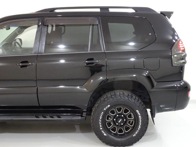 ランドクルーザープラド ＴＸリミテッド　４ＷＤ／本州仕入／寒冷地仕様／後期型／８人乗／新革調シートカバー／サンルーフ／リフトアップ／メッシュグリル＆ＴＯＹＯＴＡエンブレム／ＢＦグッドリッチ／社外テール／インナーブラックイカリング付きＨライト（33枚目）