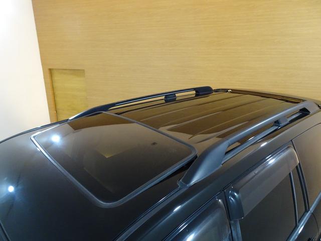 ランドクルーザープラド ＴＸリミテッド　４ＷＤ／本州仕入／寒冷地仕様／後期型／８人乗／新革調シートカバー／サンルーフ／リフトアップ／メッシュグリル＆ＴＯＹＯＴＡエンブレム／ＢＦグッドリッチ／社外テール／インナーブラックイカリング付きＨライト（34枚目）