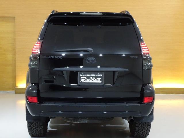 ランドクルーザープラド ＴＸリミテッド　４ＷＤ／本州仕入／寒冷地仕様／後期型／８人乗／新革調シートカバー／サンルーフ／リフトアップ／メッシュグリル＆ＴＯＹＯＴＡエンブレム／ＢＦグッドリッチ／社外テール／インナーブラックイカリング付きＨライト（35枚目）