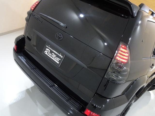 ランドクルーザープラド ＴＸリミテッド　４ＷＤ／本州仕入／寒冷地仕様／後期型／８人乗／新革調シートカバー／サンルーフ／リフトアップ／メッシュグリル＆ＴＯＹＯＴＡエンブレム／ＢＦグッドリッチ／社外テール／インナーブラックイカリング付きＨライト（38枚目）