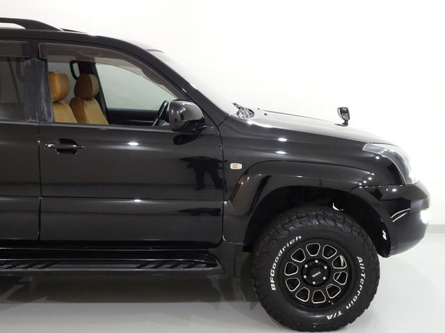 ランドクルーザープラド ＴＸリミテッド　４ＷＤ／本州仕入／寒冷地仕様／後期型／８人乗／新革調シートカバー／サンルーフ／リフトアップ／メッシュグリル＆ＴＯＹＯＴＡエンブレム／ＢＦグッドリッチ／社外テール／インナーブラックイカリング付きＨライト（46枚目）