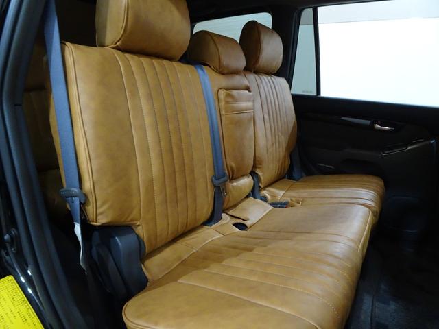 ランドクルーザープラド ＴＸリミテッド　４ＷＤ／本州仕入／寒冷地仕様／後期型／８人乗／新革調シートカバー／サンルーフ／リフトアップ／メッシュグリル＆ＴＯＹＯＴＡエンブレム／ＢＦグッドリッチ／社外テール／インナーブラックイカリング付きＨライト（59枚目）