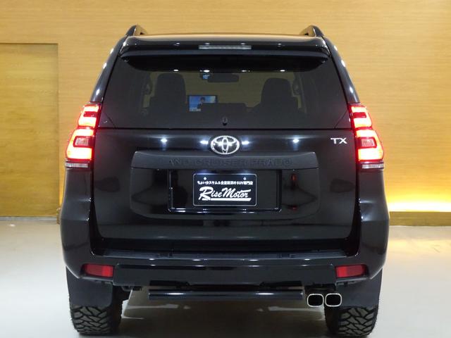 ランドクルーザープラド ＴＸ　後期型／本州仕入／リフトアップ／サンルーフ／ＴＲＤスポイラー／モデリスタマフラー／バグガード／リアバンパーガード／革調シートカバー／ナビＴＶブルートゥースＤＶＤ／リアモニター／ドラレコ／ＩＤＬＥＵＰ（5枚目）