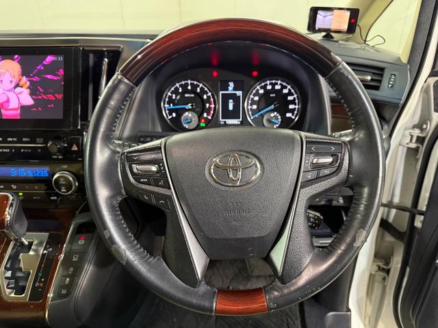 アルファード ２．５Ｇ　バックモニター　エアバッグ　横滑り防止機能　ＡＢＳ　オートクルーズコントロール　電動シート　地デジ　アイドリングストップ　パワーバックドア　ＬＥＤライト　ＥＴＣ　スマートキー　３列シート　ＤＶＤ（41枚目）