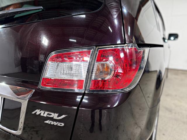 MPV 23S 両面パワースライドドア キーフリー 地デジ 助手席エアバッグ イモビライザー ナビTV Bモニター アルミ 3列 スマートカードキー パワステ オートエアコン 4WD 禁煙 パワーウィンドウ ABS(36枚目)