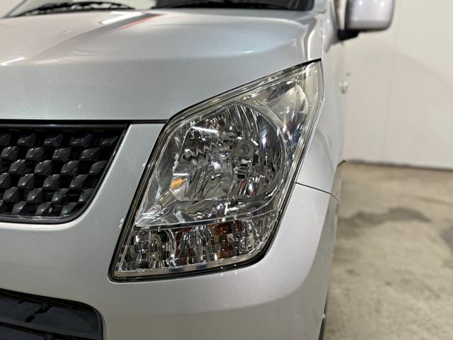 ワゴンＲ ＦＸ　シートヒータ付き　４ＷＤ車　アルミホイル　キーレスエントリーシステム　ＤＶＤ再生可能　運転席助手席エアバック　メモリナビ　エアバック　パワステ　ベンチシート車　オ－トエアコン　ナビ・ＴＶ（26枚目）